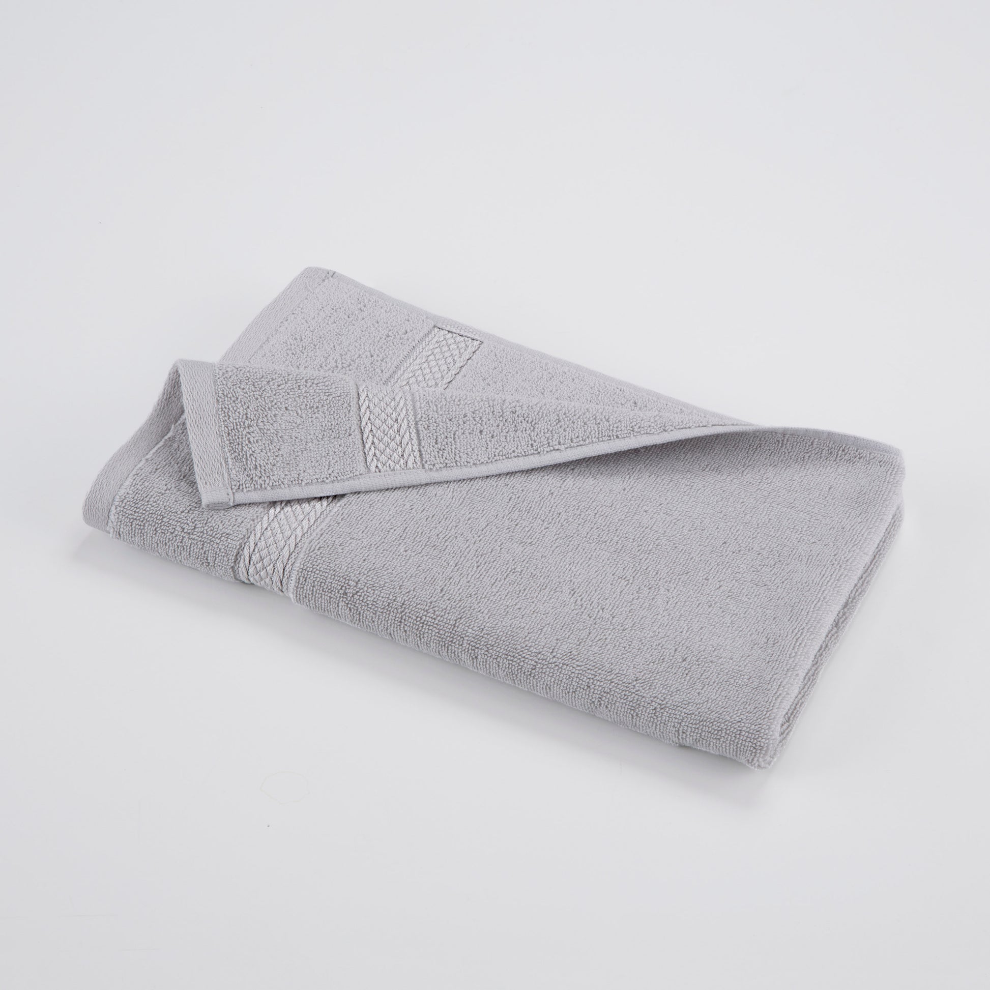 one grey towel with long edge highlighted