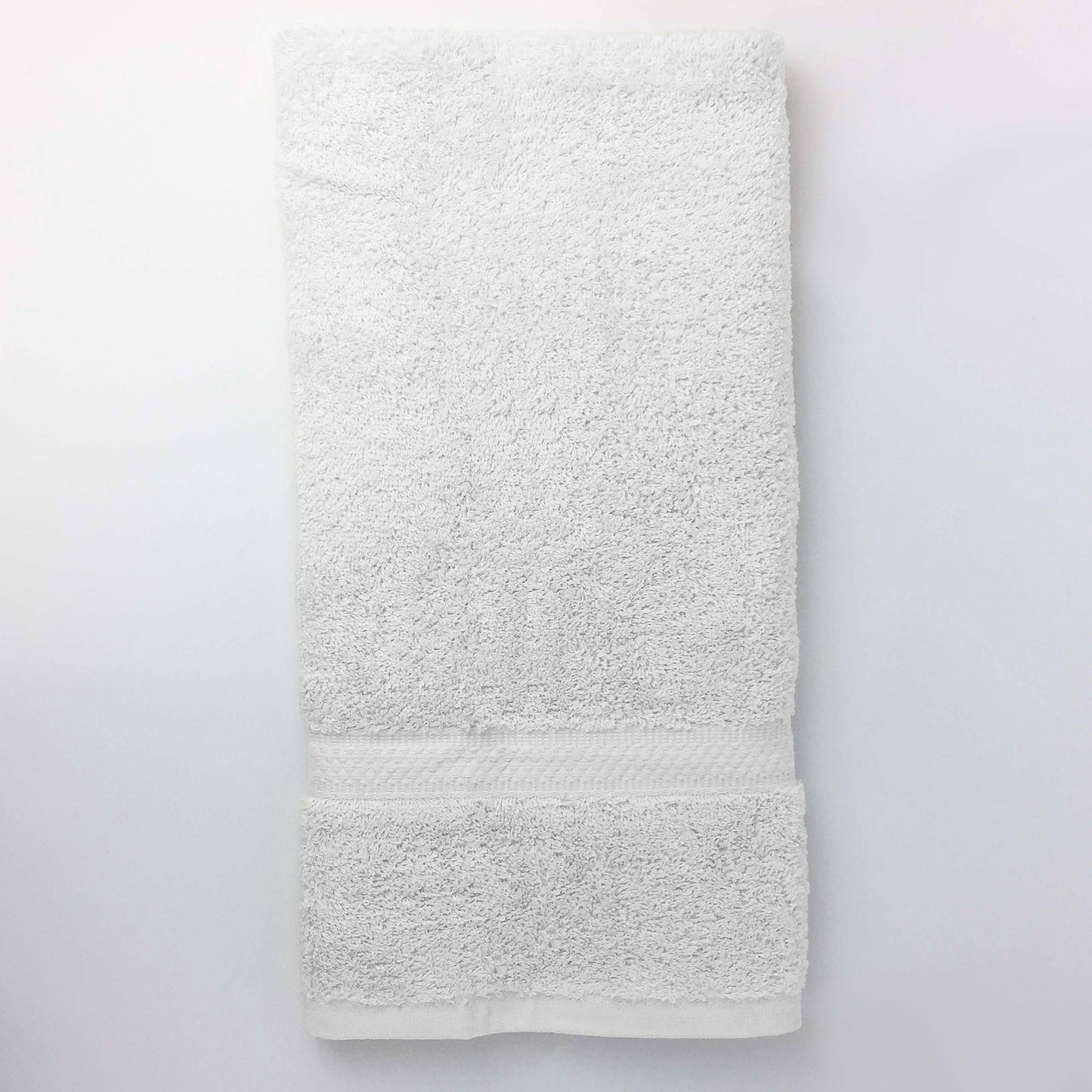 one white towel vertical closeup