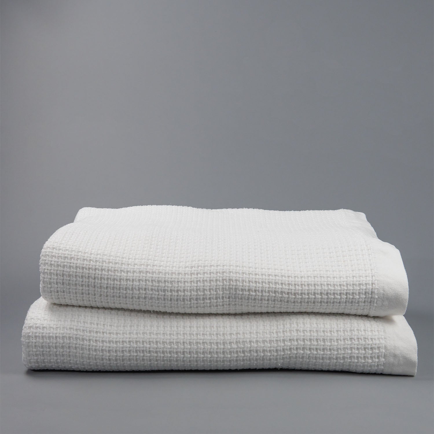 white basketweave cotton blanket