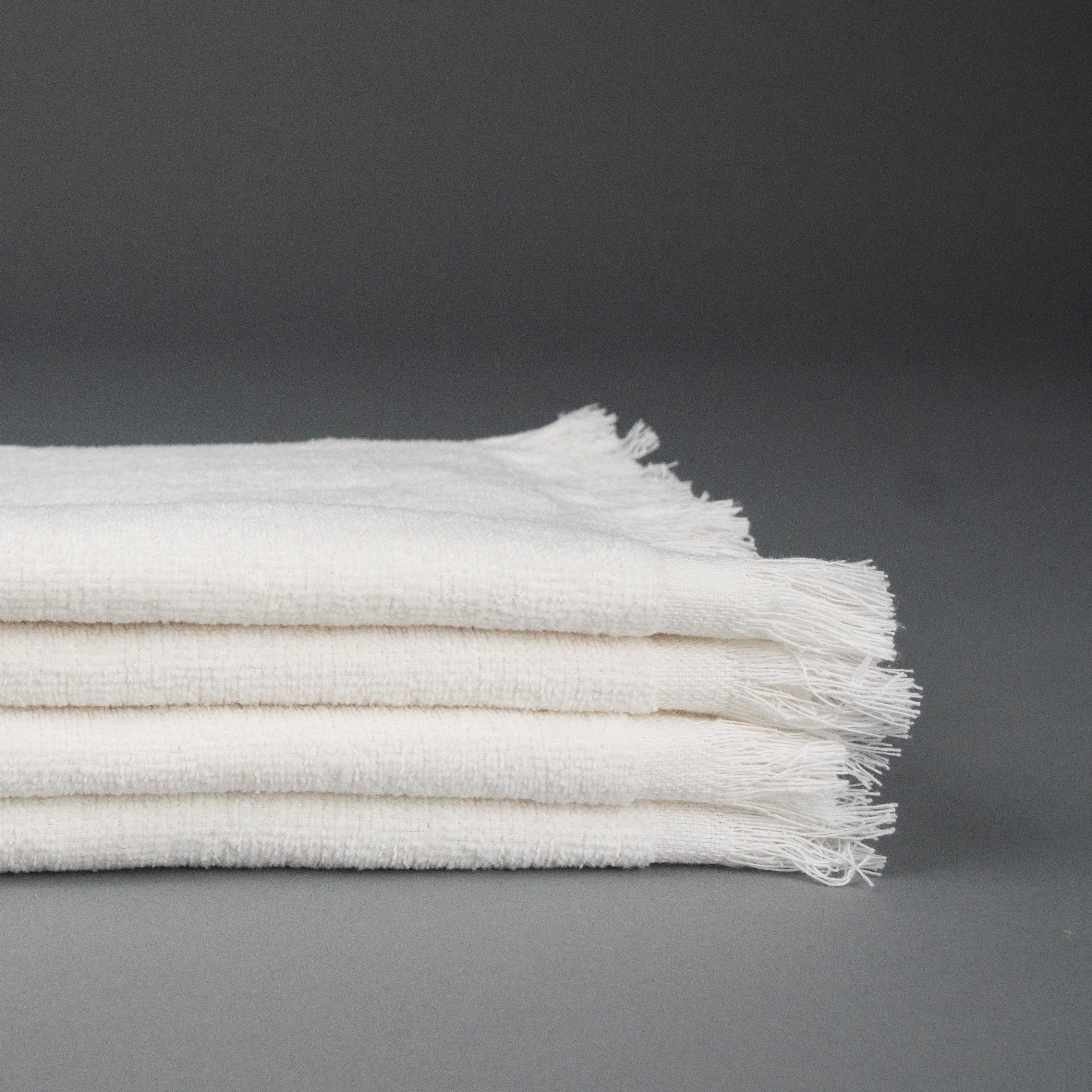 stack of four fingertip towel