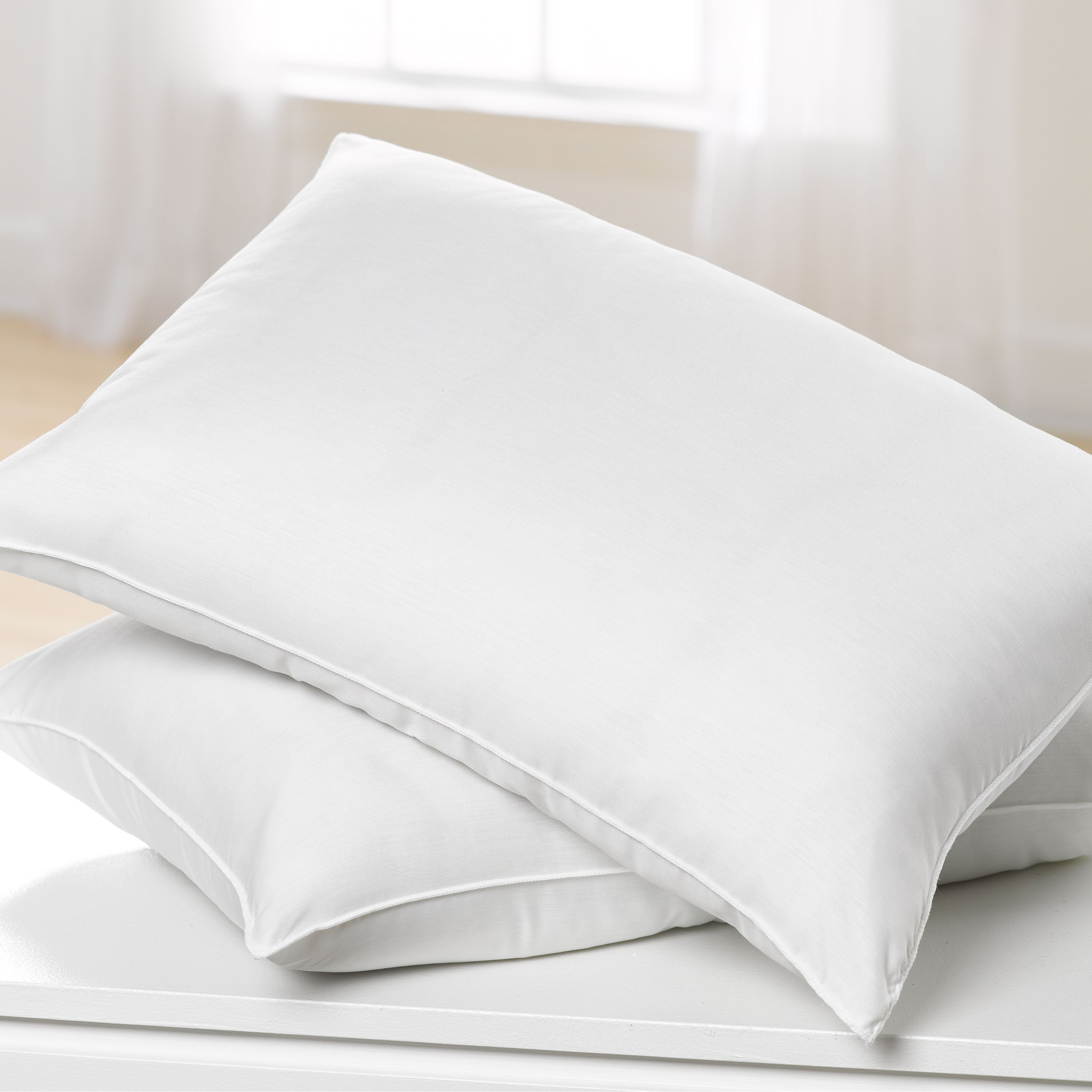 two white basic pillows