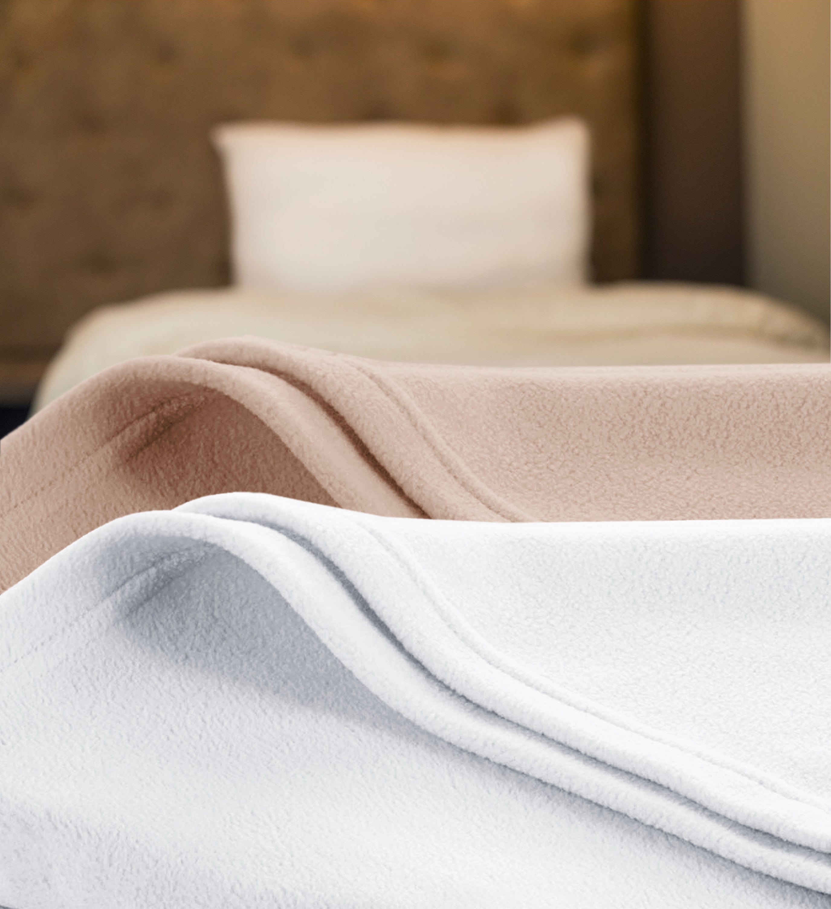 one tan and one ivory fleece slightly folded upwards