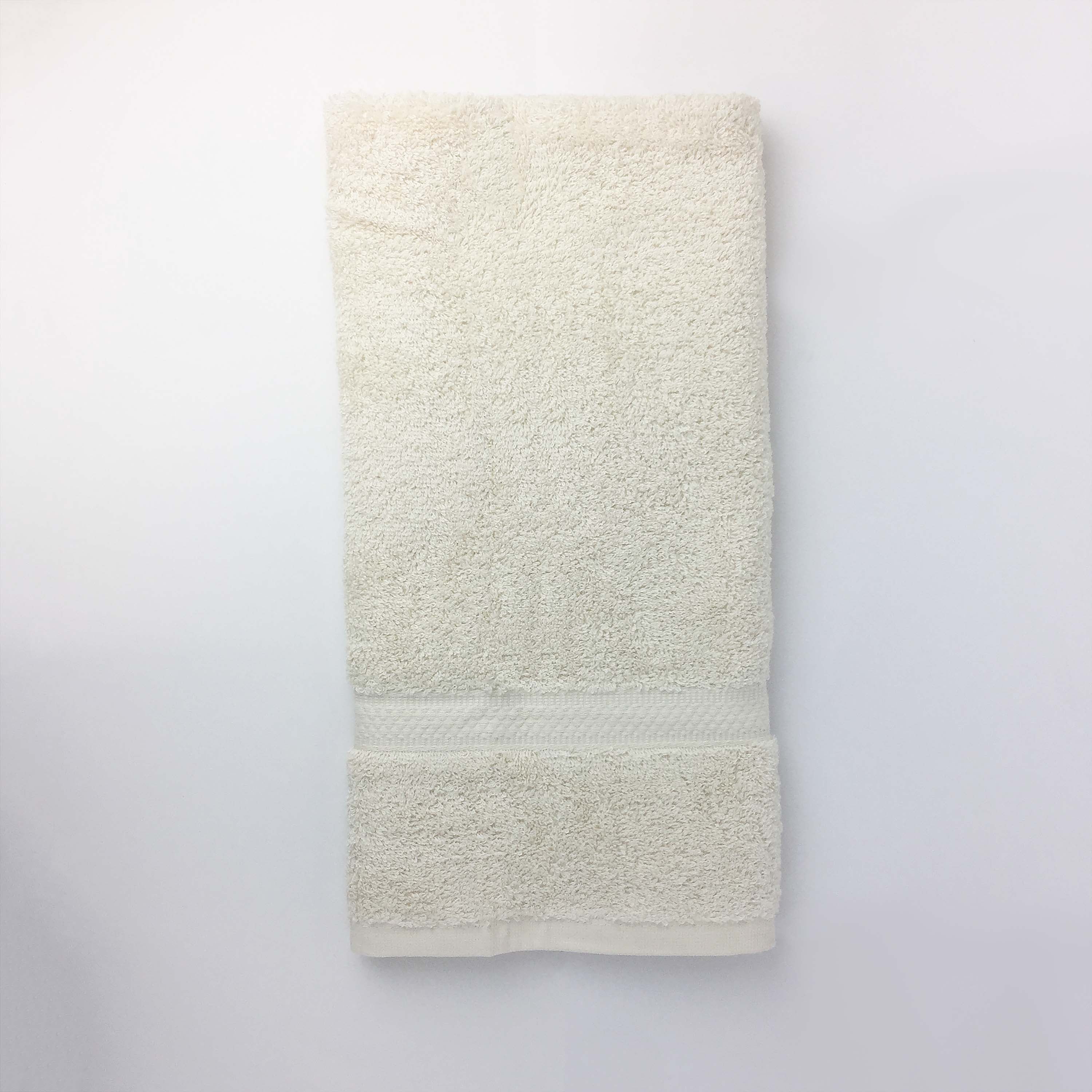 one ecru hand towel close up