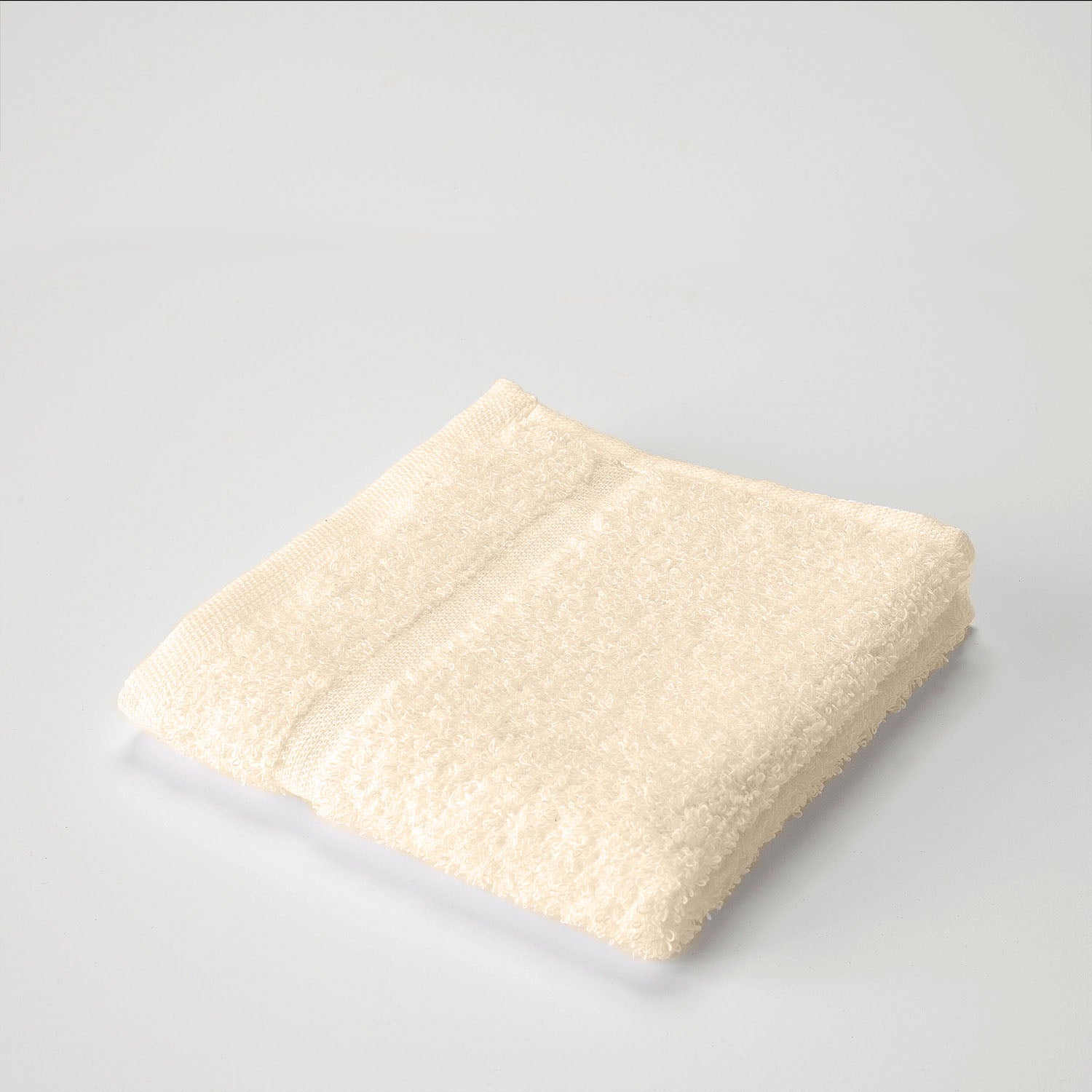 one ecru wash cloth