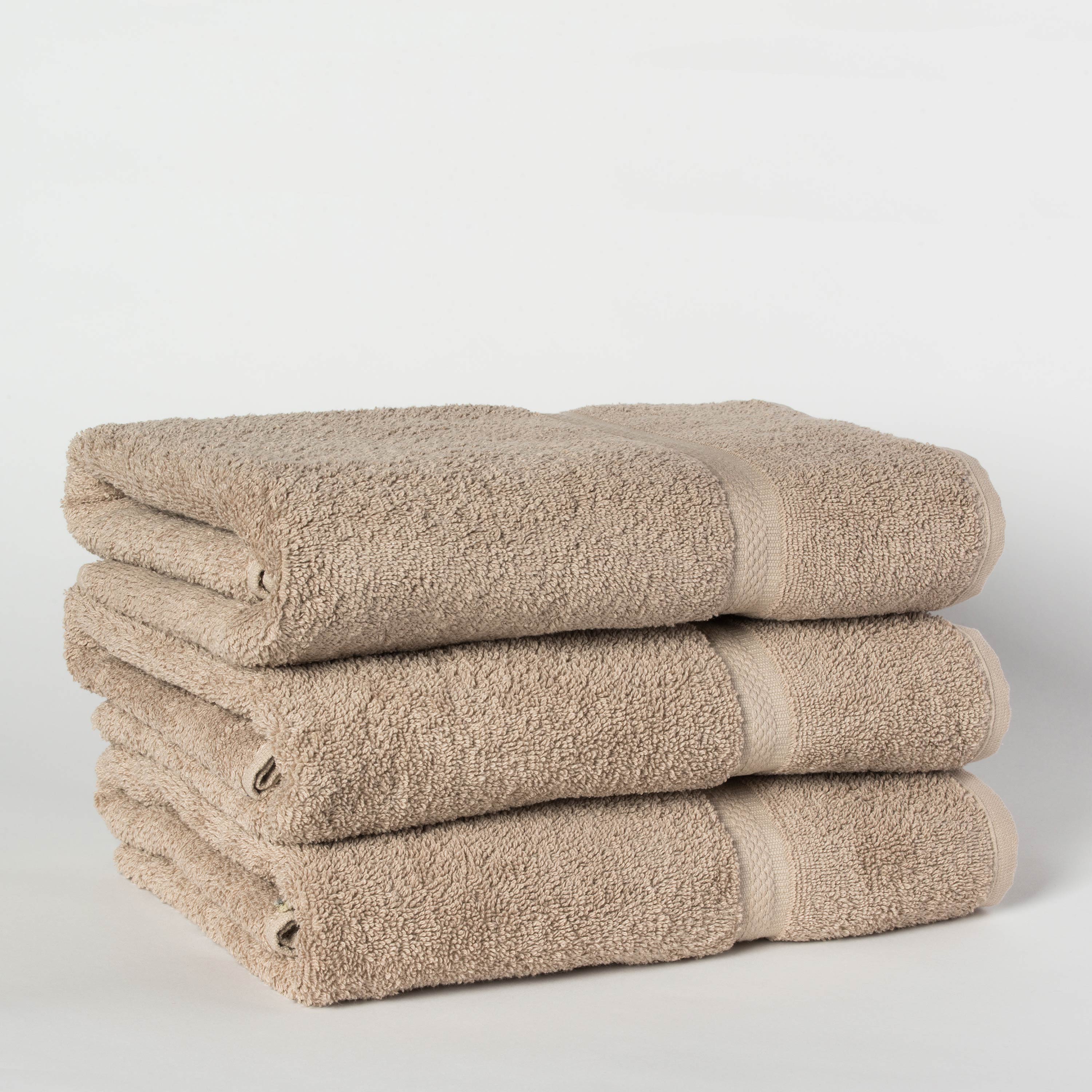 stack of three khaki towels